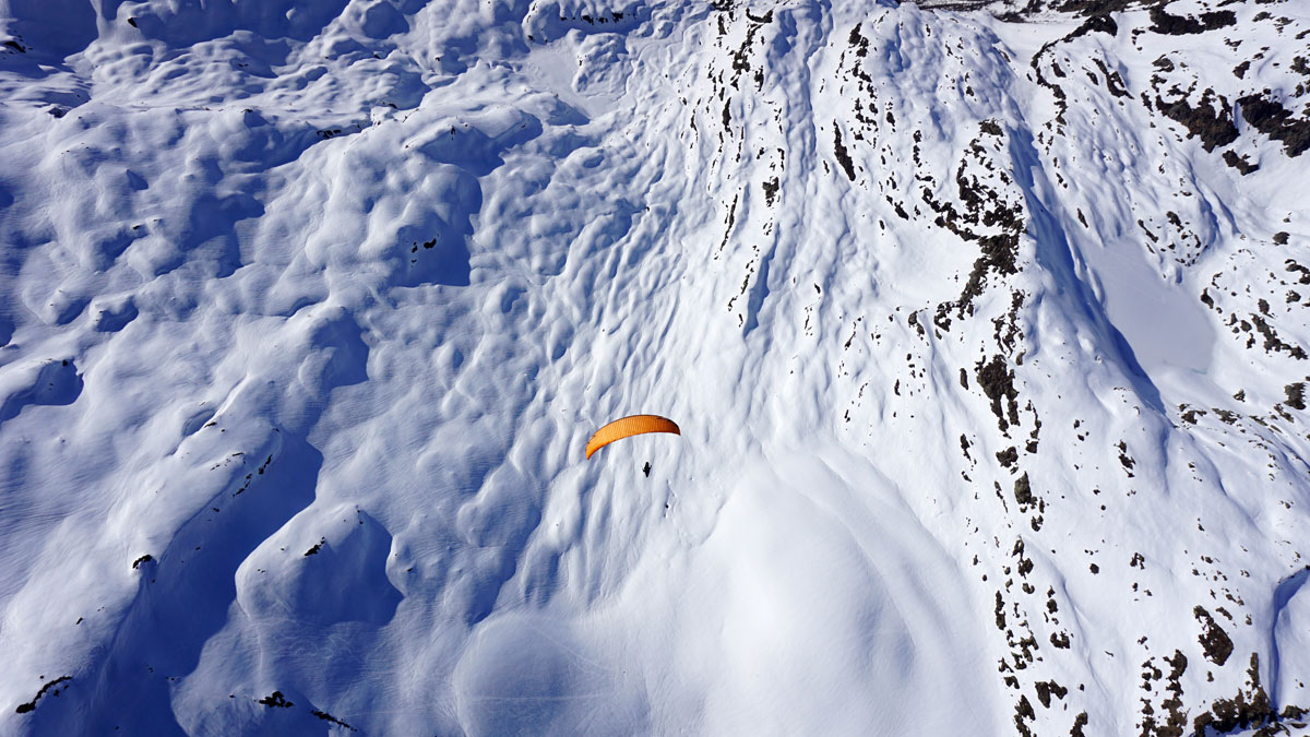 fresh snow paraglider high altitude